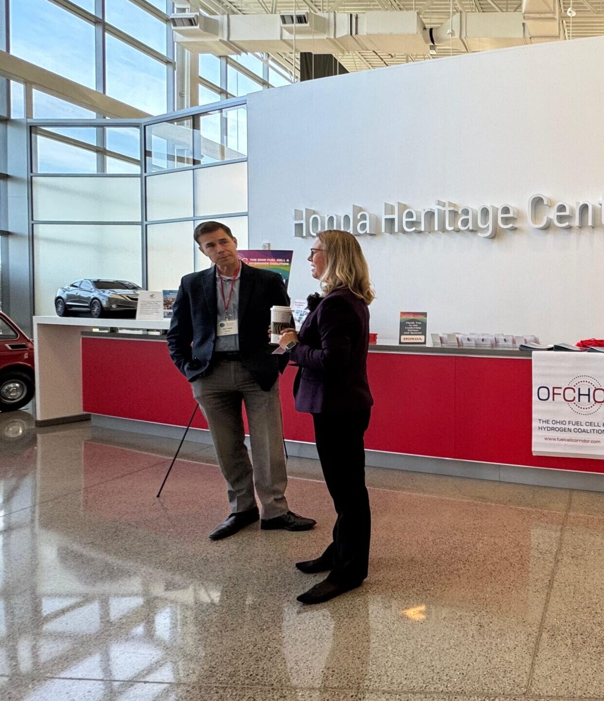 Eric Walli and Lisa Rimpf, Symposium Committee; missing Emanuel Wagner, American Honda Motor Co., Inc.,  Paul Matter, pH Matter/Power to Hydrogen